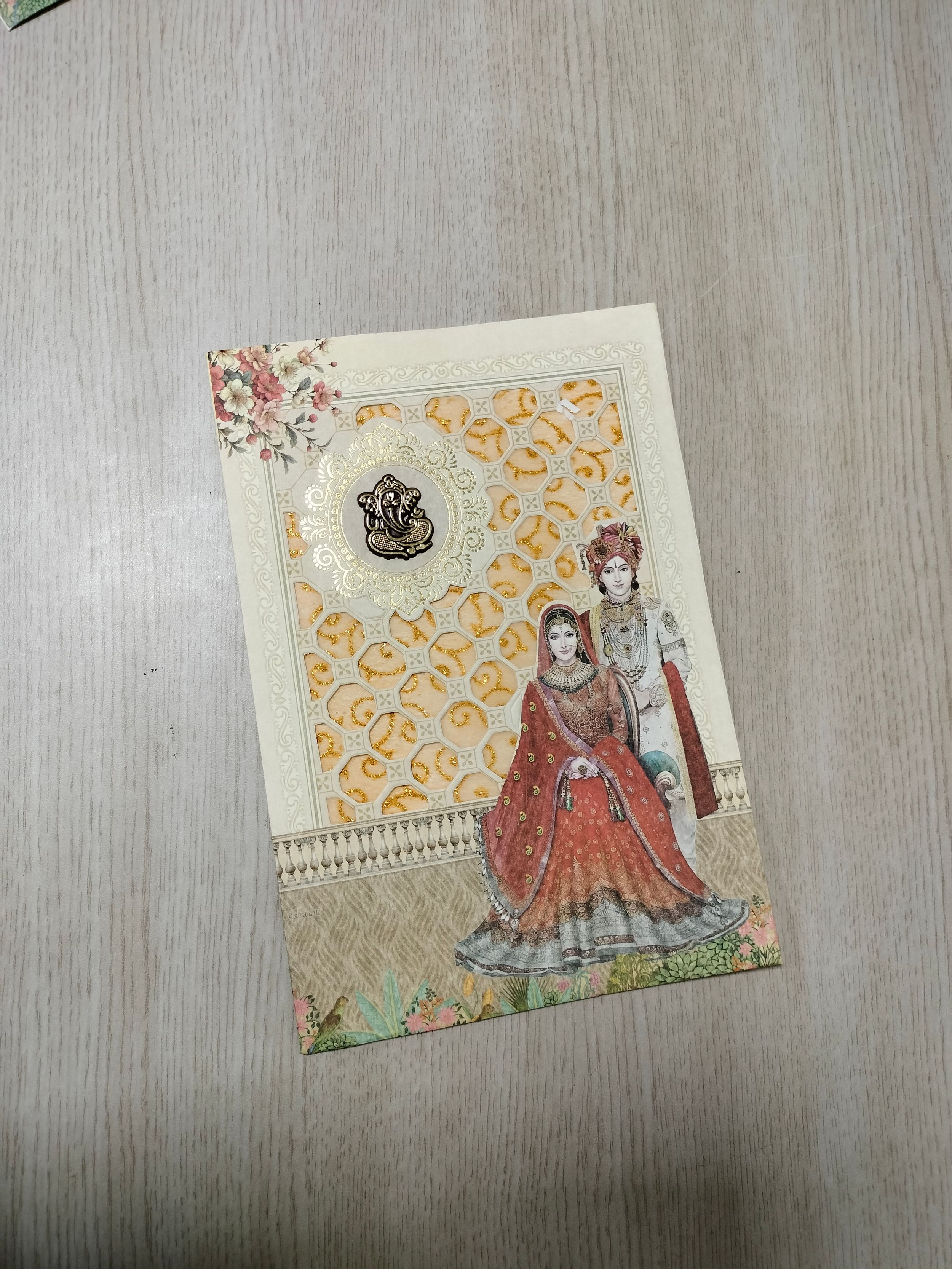 Off White Botanical Wedding Invitation Card with Golden Ganesha Motif (313072) — photo 2