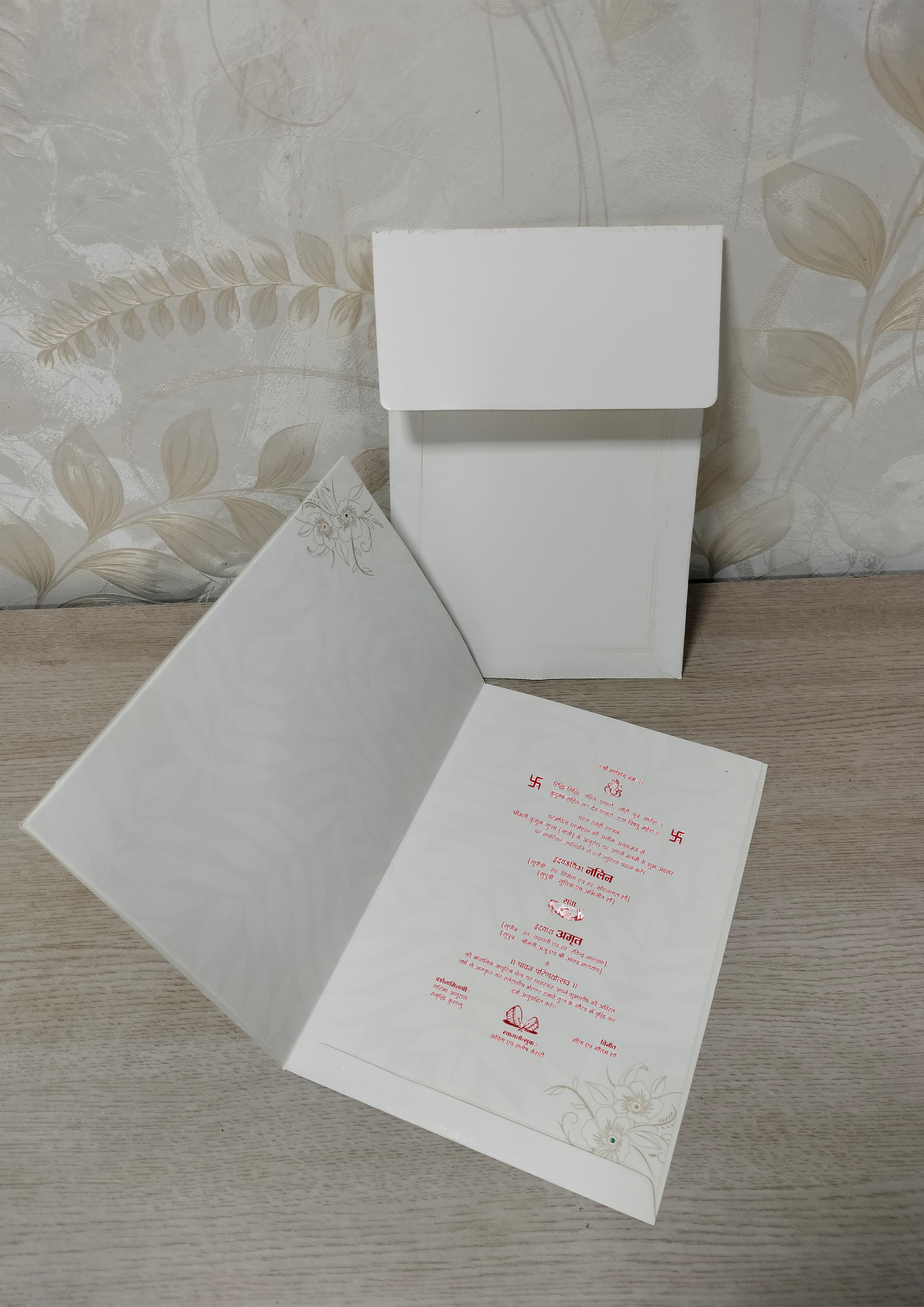 Off White Wedding Invitation Card with Ganesha Symbol and Floral Lattice Pattern (313081) — photo 4
