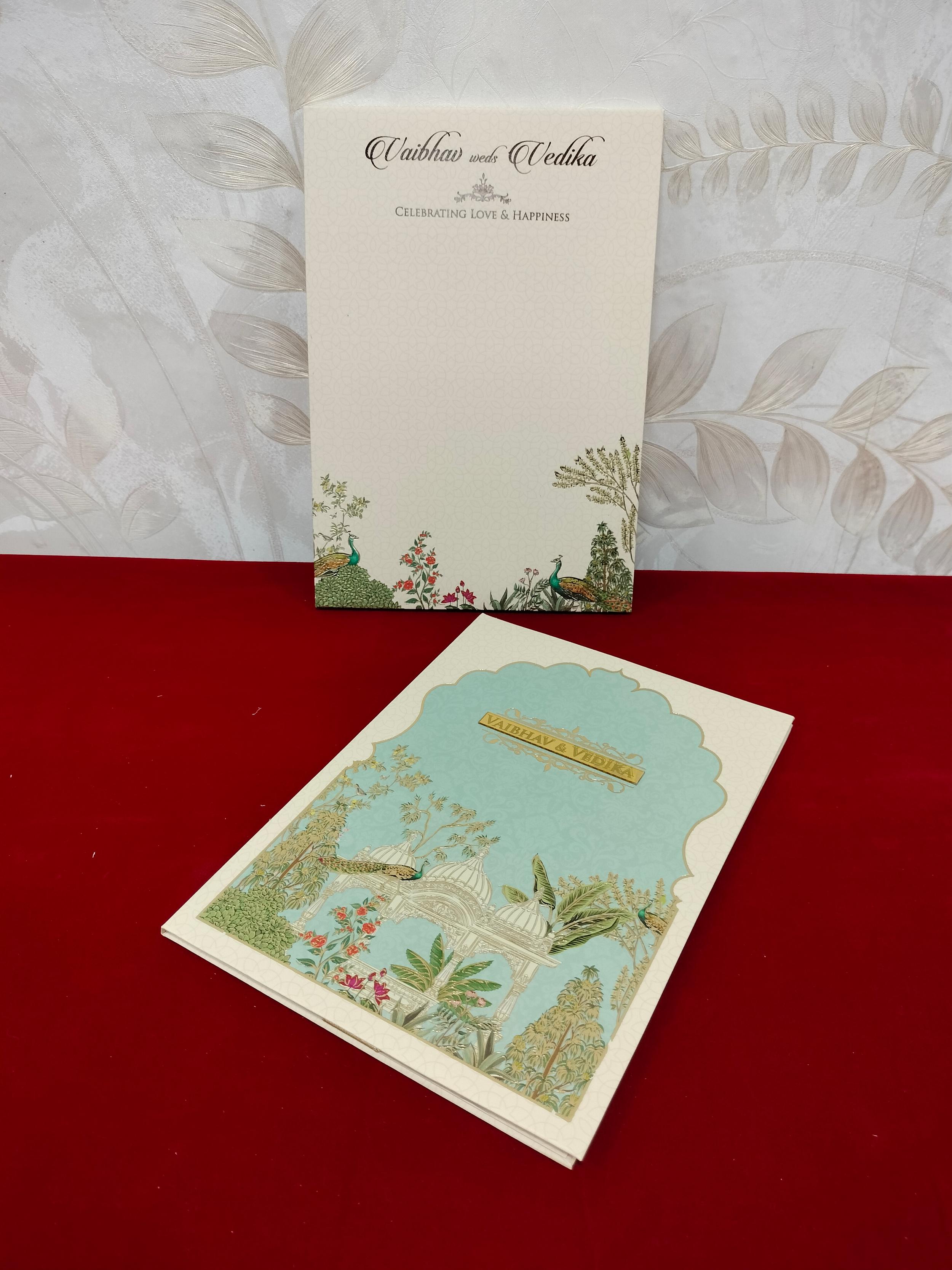 Heritage Peacock Garden Wedding Invitation Card with Pastel Aqua Jharokha and Royal Pavilion Design (3376)