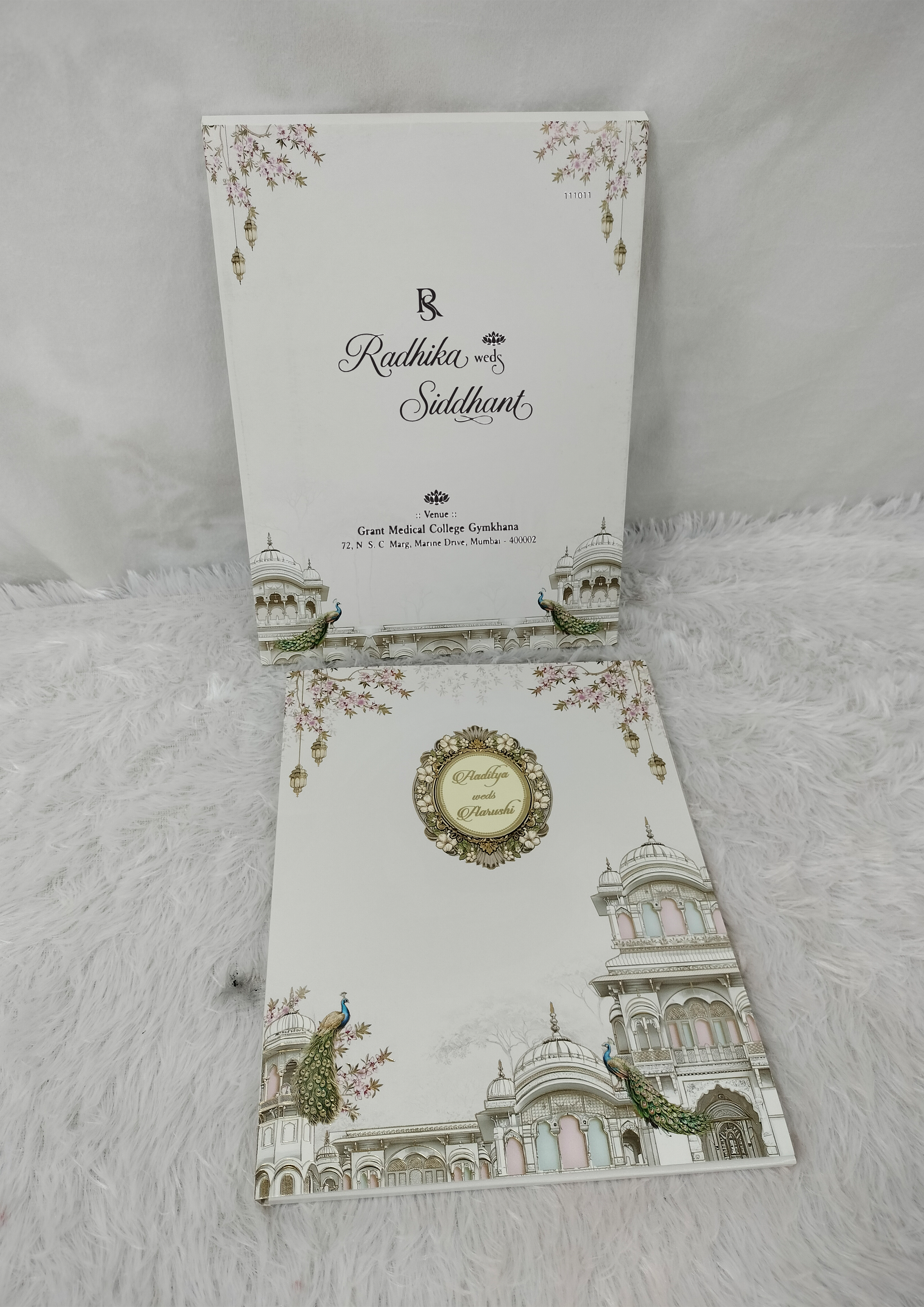 Cream Wedding Invitation Card with Palace Architecture Peacocks and Floral Crest (AC-504)